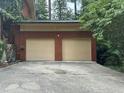 Spacious two-car garage featuring new doors and freshly painted trim at 71010 Russell, Chapel Hill, NC 27517