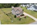 Spacious property with a fenced backyard at 85 Twelve Oaks Dr, Willow Springs, NC 27592