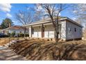 Charming single-story house with a front porch featuring brown wooden pillars at 112 Edgewood Dr, Roxboro, NC 27573