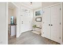 Warm and inviting entryway with stylish decor and ample natural light at 1985 Firenza Dr, Apex, NC 27502