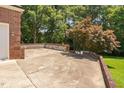 Wide driveway provides ample parking leading to the attached two car garage at 5125 Pinehall Wynd, Raleigh, NC 27604