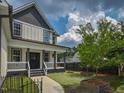 Attractive two-story home with well-manicured lawn and landscaping at 723 Lindley Dr, Durham, NC 27703