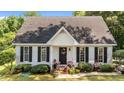Charming single-story home with a manicured lawn and beautiful landscaping at 918 Circle Dr, Angier, NC 27501