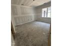 Clean, ready-to-customize bedroom with natural light and window view to yard at 207 S Main St # A, Four Oaks, NC 27524