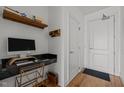 Bright home office with hardwood floors and built-in desk, perfect for working from home at 400 W North St # 900, Raleigh, NC 27603
