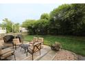 Inviting backyard patio with comfortable seating, perfect for outdoor relaxation and entertaining guests at 5456 Thunderidge Dr, Raleigh, NC 27610