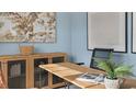 Comfortable home office with stylish furniture and natural light at 155 Babbling Creek Dr, Youngsville, NC 27596