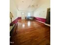 Spacious living room with hardwood floors, and natural light from the windows at 175 Ann Dr, Timberlake, NC 27583