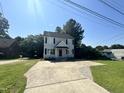 View of the house, ample parking, and proximity to neighborhood amenities at 2907 S S Roxboro St, Durham, NC 27707