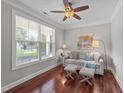 Cozy home office features hardwood floors, natural light, and a comfortable seating area at 120 Silver Bluff St, Holly Springs, NC 27540