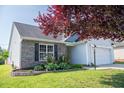 A partially obscured view of the front of a single-Gathering home at 326 Slate Dr, Gibsonville, NC 27249
