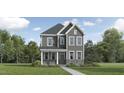 Charming two-story home featuring a stone-accented facade and a well-manicured lawn at 892 Cassa Clubhouse Way, Knightdale, NC 27545