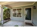 Cozy front porch with a view through a large window and an inviting front door at 519 High Ridge Dr, Durham, NC 27707
