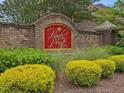 A brick sign at the entrance to the Banks Pointe community adds charm and exclusivity at 9045 Chelsea Dr, Raleigh, NC 27603