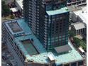 Aerial view showcasing a high-rise building with a pool and lounge area under construction at 400 W Main St # 2601, Durham, NC 27701
