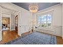 Home office with hardwood floors, window seat, and blue ceiling at 291 Riverstone Dr, Pittsboro, NC 27312