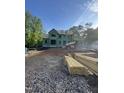View of new construction home with wood and other construction materials present at 501 Hertford St, Raleigh, NC 27609