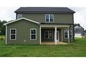 Backyard featuring a covered porch at 115 Grinnel Loop, Sanford, NC 27332