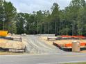 Construction site; concrete foundation has been laid for new home at 6298 Swanns Station Rd, Sanford, NC 27332