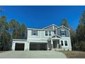 Charming two-story home featuring a two-car garage and inviting entrance at 6298 Swanns Station Rd, Sanford, NC 27332