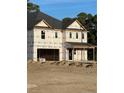 Two-story house under construction, wrapped in protective covering, partially landscaped yard at 2833 Sheriff Watson Rd, Sanford, NC 27332