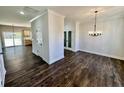 Formal dining room with hardwood floors and a chandelier at 36 Fort Mcclary Ct, Cameron, NC 28326