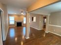 Spacious living room with hardwood floors and fireplace at 708 Omaha Dr, Broadway, NC 27505