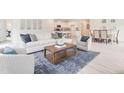 Open-concept living area with a spacious feel and plenty of natural light at 903 Windrace Trl, Sanford, NC 27332