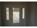 A welcoming front door with sidelights, offering a glimpse of the outdoors, and enhancing natural light at 154 Nectar Ln, Bunnlevel, NC 28323