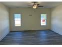 Bright and spacious living room featuring neutral walls, and a ceiling fan at 4983 (Lot 3) Ray Rd, Spring Lake, NC 28390