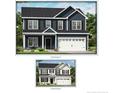 Two-story house with navy blue siding, white accents, and a two-car garage at 78 Bennett Rd, Coats, NC 27521