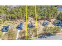 Aerial view of a property with a generous lot size surrounded by mature trees at 6935 Old Jefferson Davis Hwy, Cameron, NC 28326