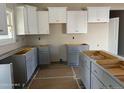 New construction kitchen featuring gray and white shaker cabinets at 6967 Old Jefferson Davis Hwy, Cameron, NC 28326