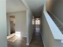 Bright entryway with hardwood floors and view into the living area at 826 Roberts Rd, Sanford, NC 27332