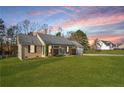 Beautiful single-story home with spacious front yard and attached two-car garage at 58 Bayleaf Ln, Sanford, NC 27332