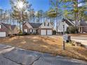 House exterior view, two-car garage, and mailbox at 85 Shining Water Ln, Spring Lake, NC 28390