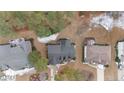 Aerial view of house and surrounding homes at 60 Rolling Pines Dr, Spring Lake, NC 28390