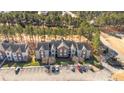 Aerial view of a condo building showcasing its location and landscaping at 62 Gallery Dr # 204, Spring Lake, NC 28390