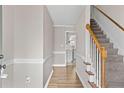 Bright and spacious entryway with hardwood floors and a staircase leading upstairs at 1003 Kelly Dr, Nashville, NC 27856