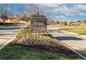 Legacy Park community entrance sign and paved roads at 174 High Woods Rdg, Chapel Hill, NC 27517