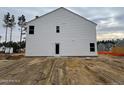 Rear view of a two-story house under construction at 283 Rocking Horse Ln, Sanford, NC 27332