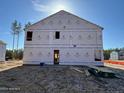 Rear view of a two-story house under construction, showing the windows and the back porch at 283 Rocking Horse Ln, Sanford, NC 27332