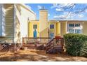 Spacious back deck with stairs and wooden railing at 82 Pine Hawk Dr, Spring Lake, NC 28390