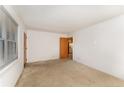 Bright living room with neutral walls and carpet at 1600 Dogwood Acres Dr, Sanford, NC 27330