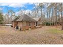 Brick home with deck and spacious backyard at 1156 Deerfoot Trl, Sanford, NC 27332