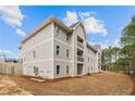 Apartment building side view, showcasing building materials and grounds at 260 Gallery Dr # 201, Spring Lake, NC 28390