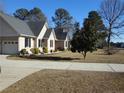 Charming one-story brick home with a two-car garage and long driveway at 849 Melody Ln, Cameron, NC 28326