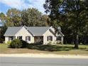 Attractive one-story brick home with a well-kept lawn and landscaping, offering great curb appeal at 849 Melody Ln, Cameron, NC 28326