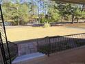 Steps leading to the house with a pond view from porch at 207 Mcleod Dr, Sanford, NC 27330