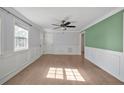 Spacious living room featuring hardwood floors and neutral colors at 206 Justice Heights St, Apex, NC 27502